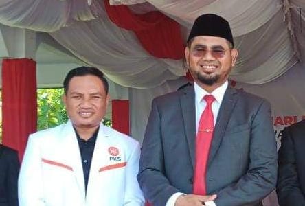 Foto Iksan Kalesarang dan Bupati Bassam Kasuba. (Istimewa)