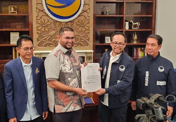 Foto Calon Bupati Bassam Kasuba dan Calon Wakil Bupati Helmi Umar Mikcsin (Istimewa)