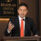 Ket: kuasa hukum Arifin Saroa, Risno N. Laumara.